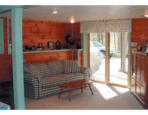 12 Crooks Road North Brookfield, MA 01535 - Photo 16 of 16 a view of balcony with floor to ceiling windows and yard