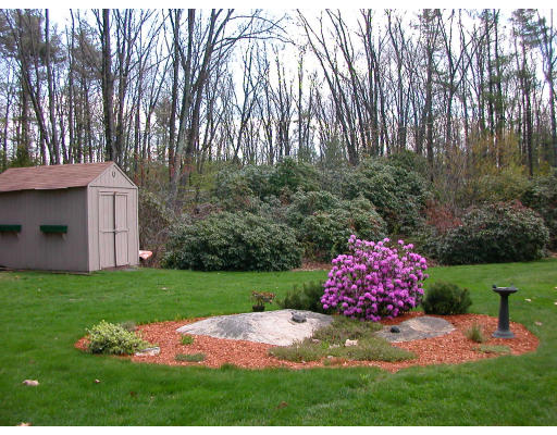 12 Crooks Road North Brookfield, MA 01535 - Photo 5 of 16 a backyard of a house with lots of green space