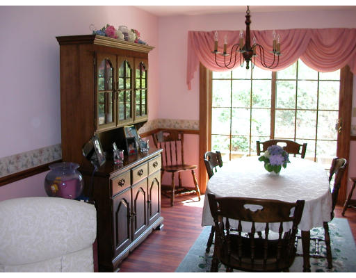 12 Crooks Road North Brookfield, MA 01535 - Photo 7 of 16 a view of a dining room with furniture window and outside view