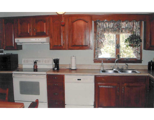 12 Crooks Road North Brookfield, MA 01535 - Photo 10 of 16 a kitchen with a sink cabinets and window