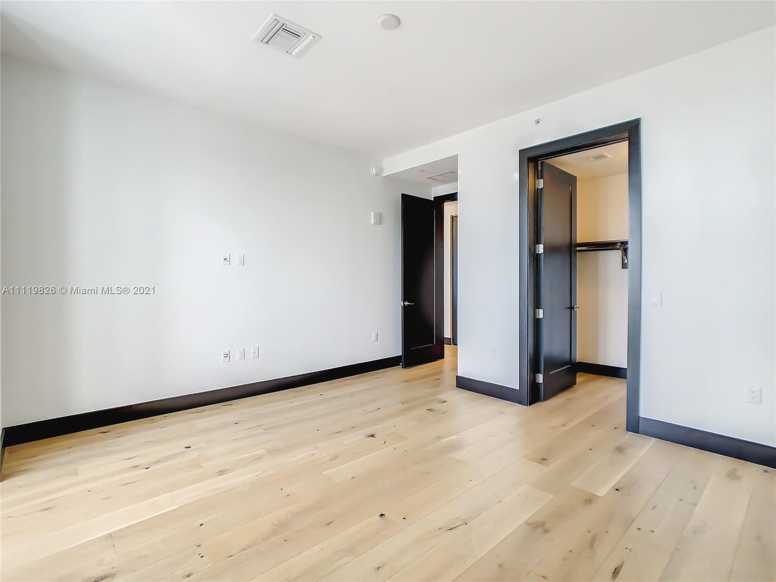 340 Southeast 3rd Street, Unit PH2 Miami, FL 33131 - Photo 24 of 54 a view of an empty room