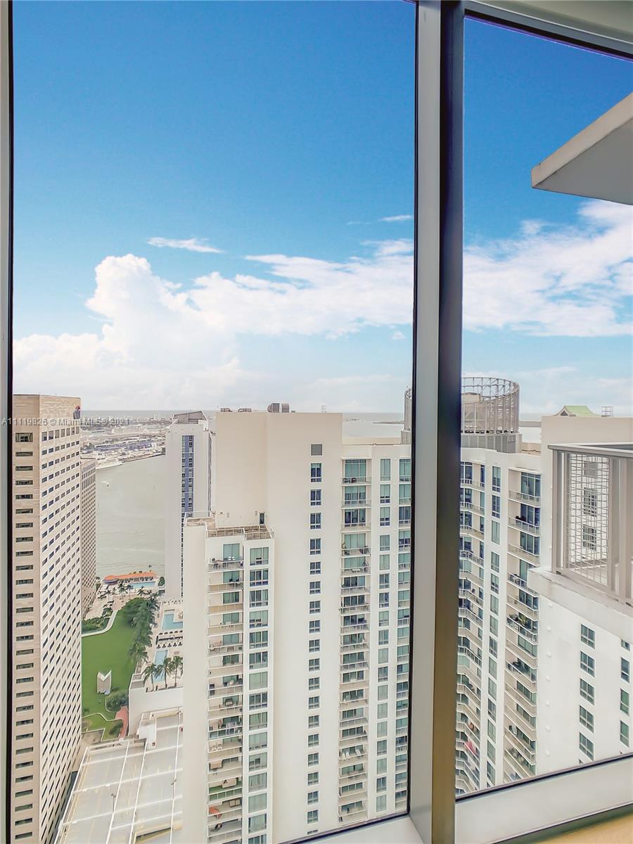 340 Southeast 3rd Street, Unit PH2 Miami, FL 33131 - Photo 27 of 54 a view of a city from a balcony
