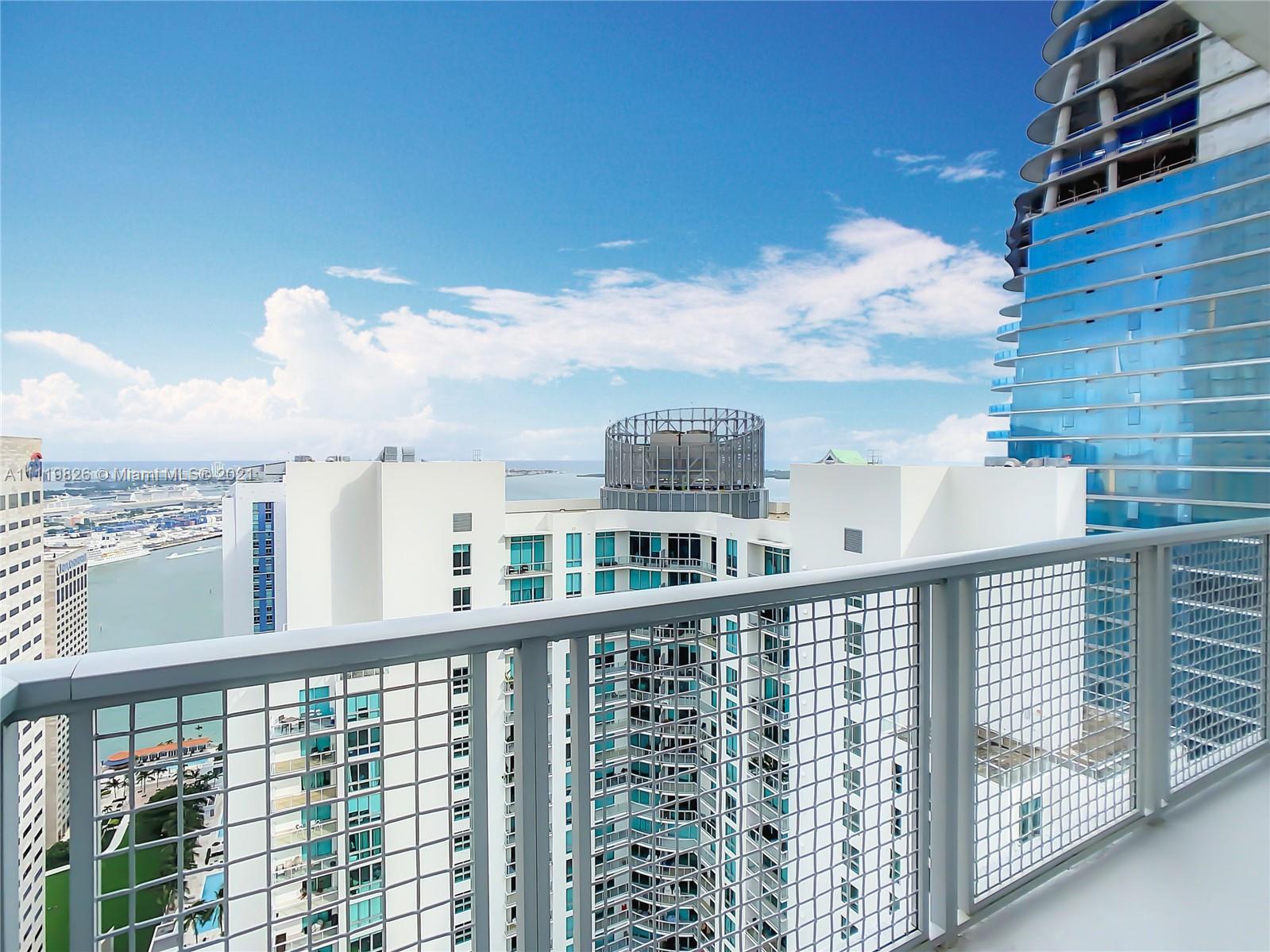 340 Southeast 3rd Street, Unit PH2 Miami, FL 33131 - Photo 36 of 54 a view of a balcony with city view