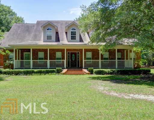 182 Briarwood Road, Unit 2 Guyton, GA 31312 - Photo 1 of 1 a view of a house with a yard and plants
