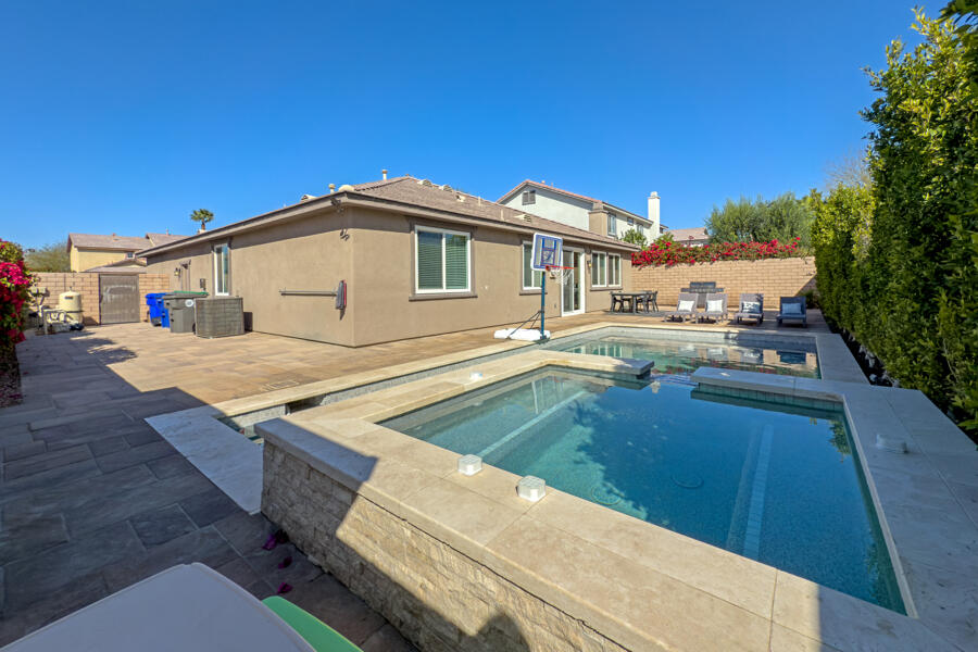43784 Riunione Place Indio, CA 92203 - Photo 28 of 54 a view of residential houses with outdoor space