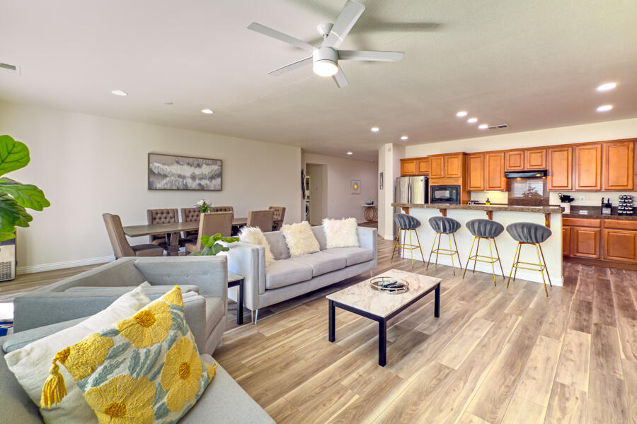 43784 Riunione Place Indio, CA 92203 - Photo 10 of 54 a living room with furniture and kitchen view