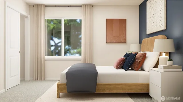 a bedroom with a bed and window