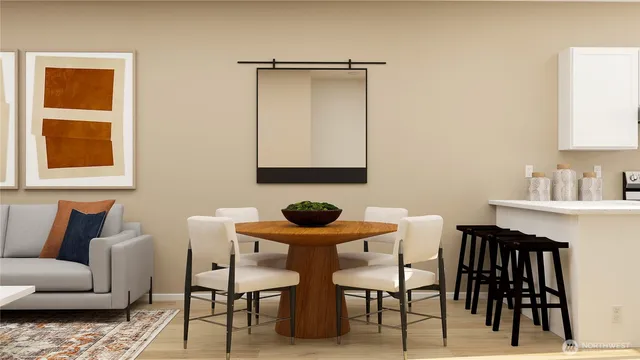 a view of a livingroom with furniture and a window