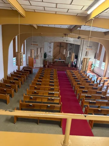 a group of people sitting on a street