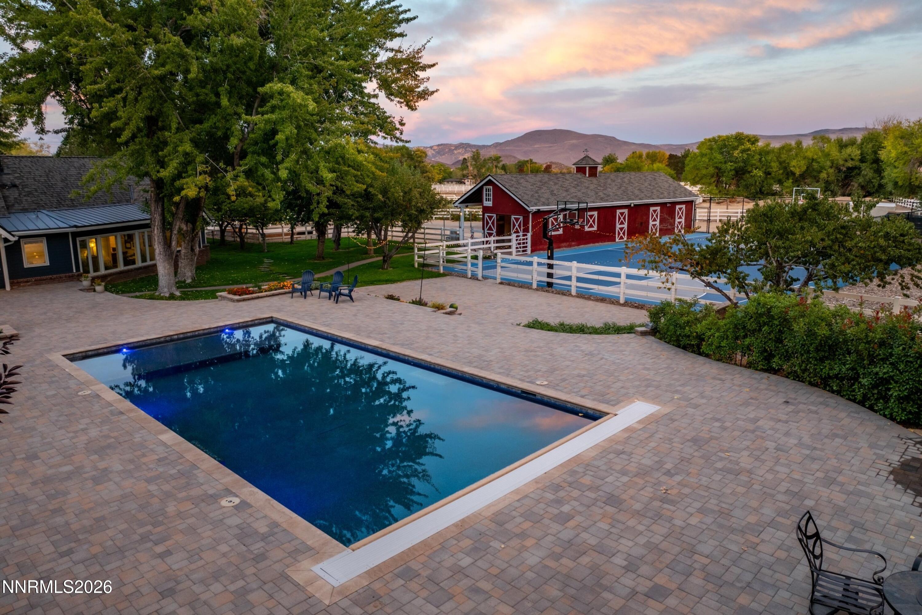 1500 Holcomb Ranch Lane Reno, NV 89511 - Photo 5 of 117 005_119-print-1500_holcomb_drone_twiligh