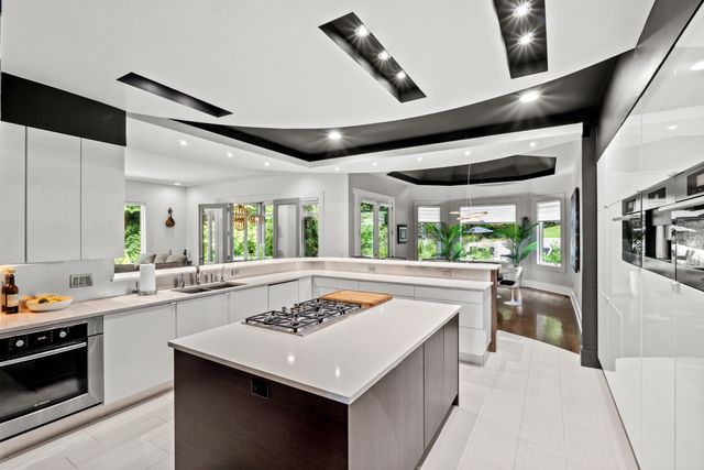 a living room with fireplace furniture and a flat screen tv