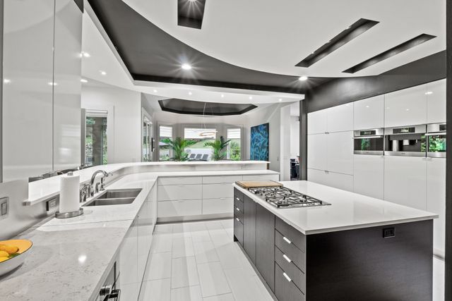 a view of a livingroom with furniture and lounge chair