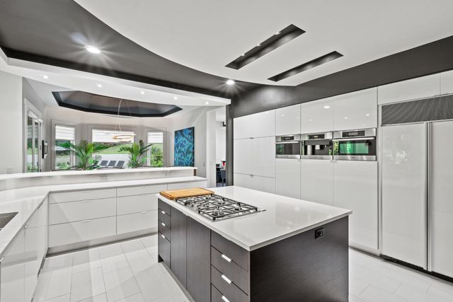 a work room with furniture and a window