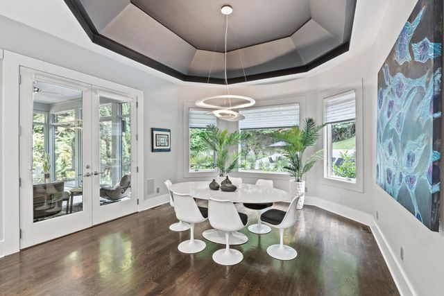 a bathroom with a sink a toilet and a window