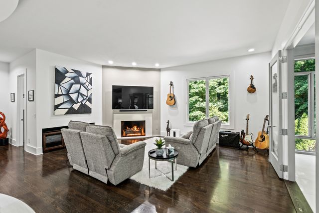 a view of a swimming pool with a outdoor seating