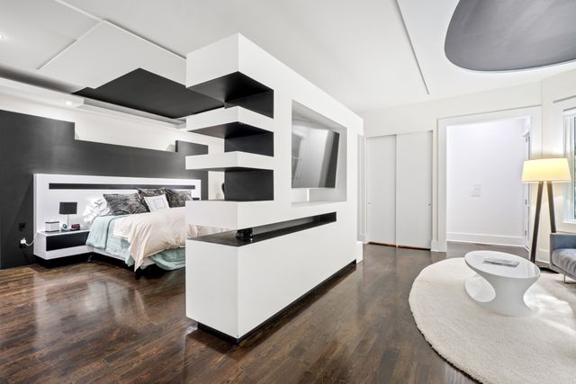 an aerial view of a house with a swimming pool