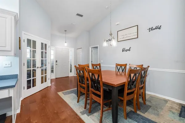 a view of a dining room with furniture