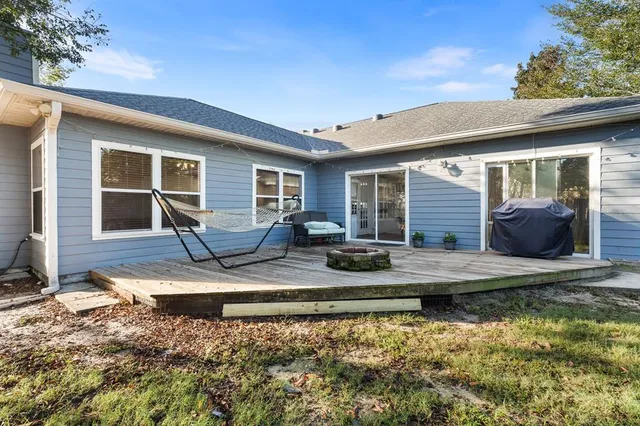a view of a lounge chairs in patio of the house