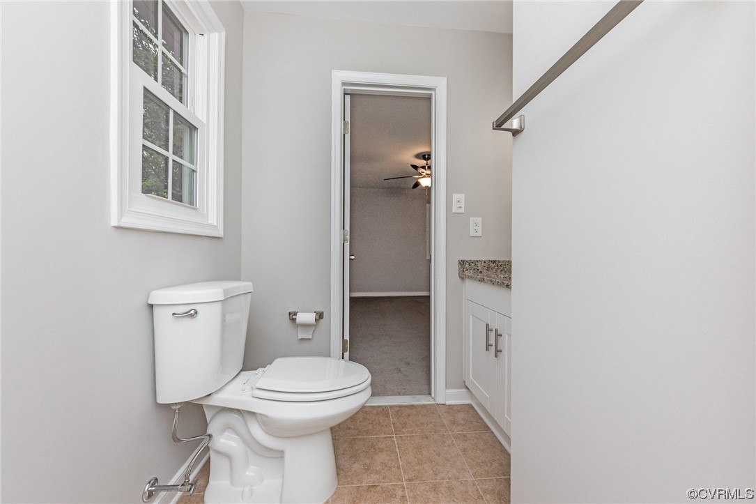 10200 Edgecliff Lane Chesterfield, VA 23832 - Photo 15 of 25 a bathroom with a toilet sink and mirror
