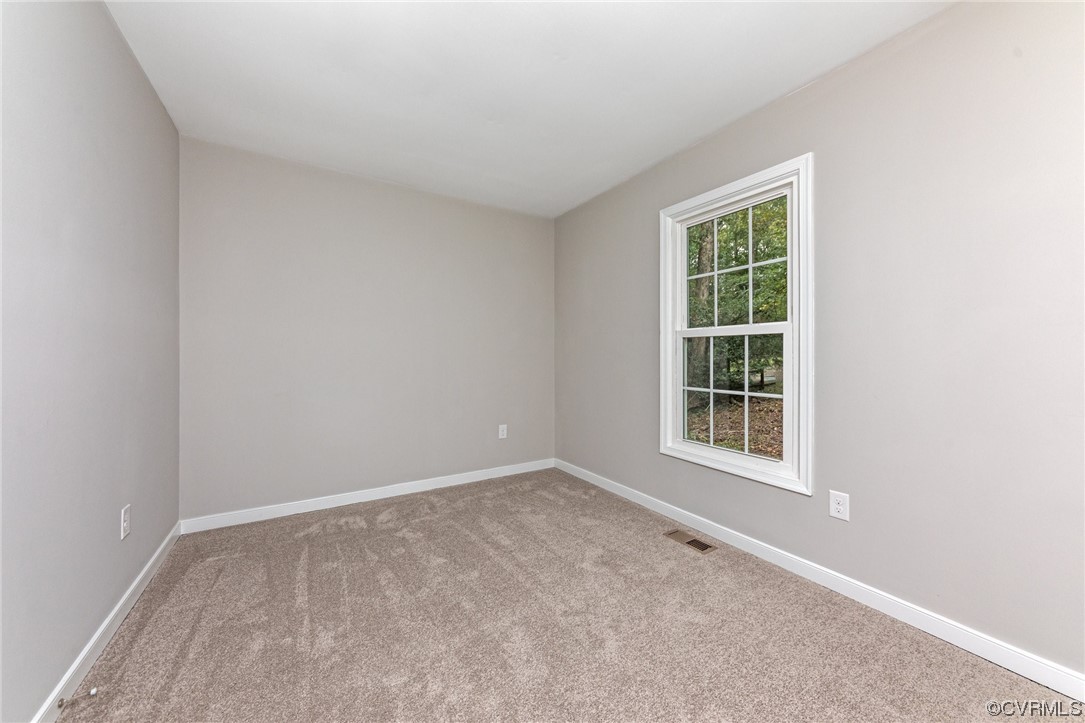 10200 Edgecliff Lane Chesterfield, VA 23832 - Photo 18 of 25 an empty room with windows