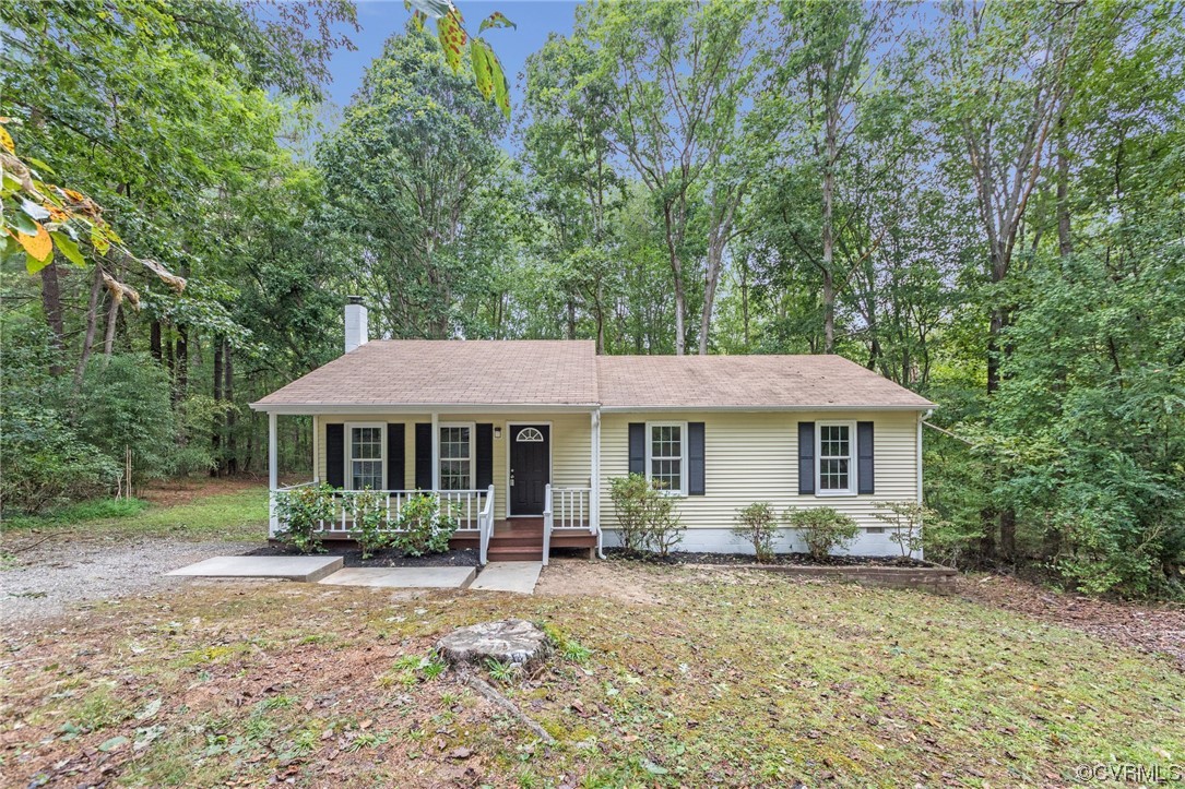 10200 Edgecliff Lane Chesterfield, VA 23832 - Photo 22 of 25 a house with trees in the background