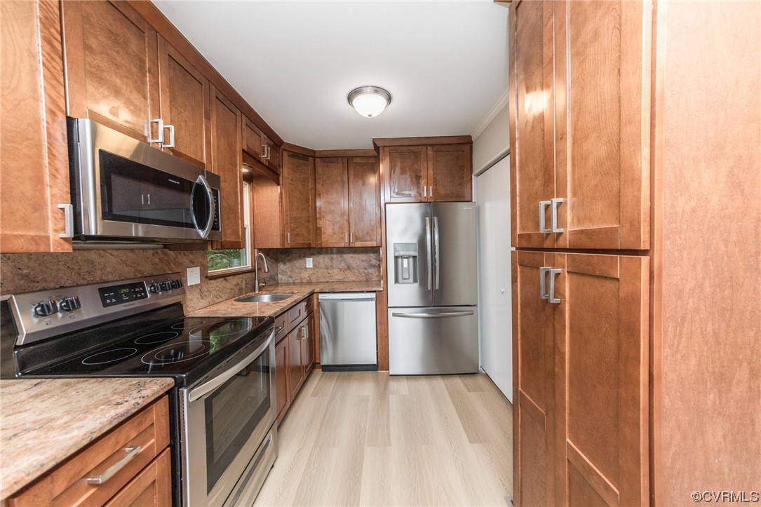 10200 Edgecliff Lane Chesterfield, VA 23832 - Photo 3 of 25 a kitchen with a refrigerator stove and microwave
