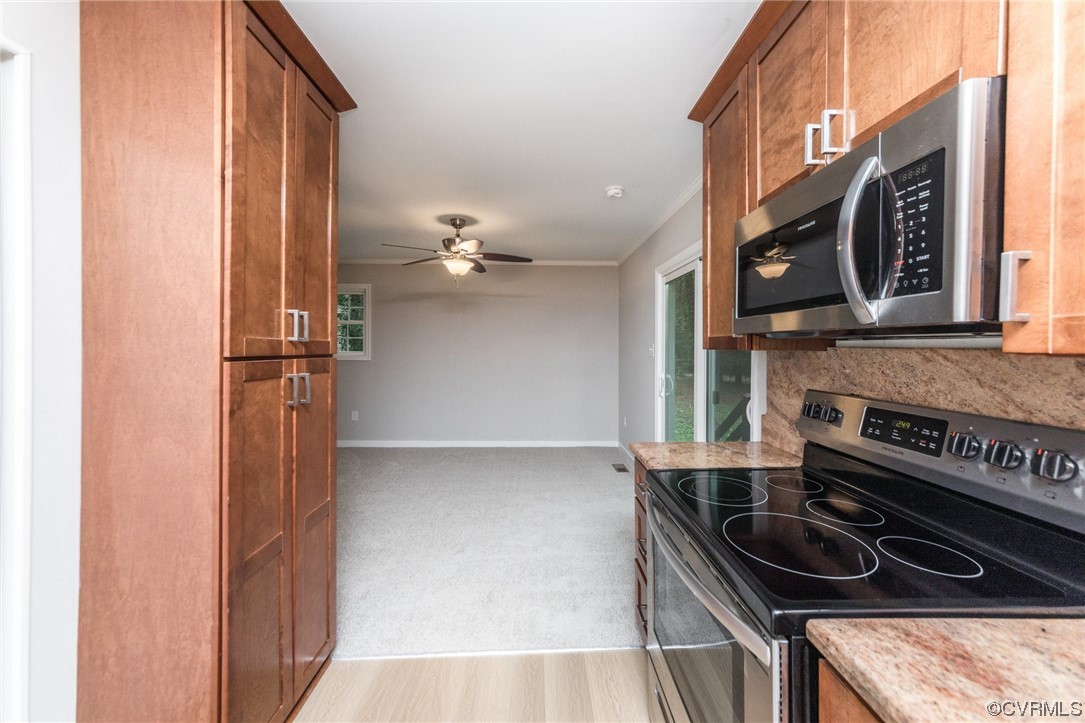 10200 Edgecliff Lane Chesterfield, VA 23832 - Photo 5 of 25 a kitchen with a sink and cabinets