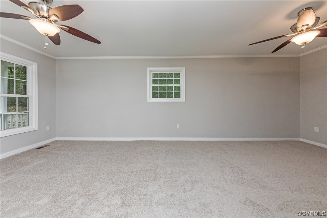 10200 Edgecliff Lane Chesterfield, VA 23832 - Photo 10 of 25 an empty room with windows and fan