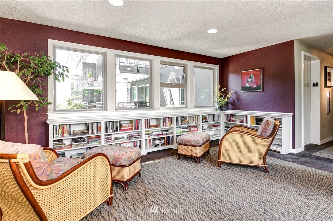 275 West Roy Street, Unit 319 Seattle, WA 98119 - Photo 14 of 18 a living room with furniture and a window
