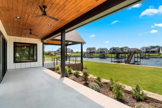 a view of a swimming pool with an outdoor seating