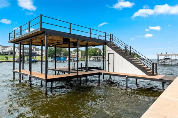 a view of swimming pool with seating area
