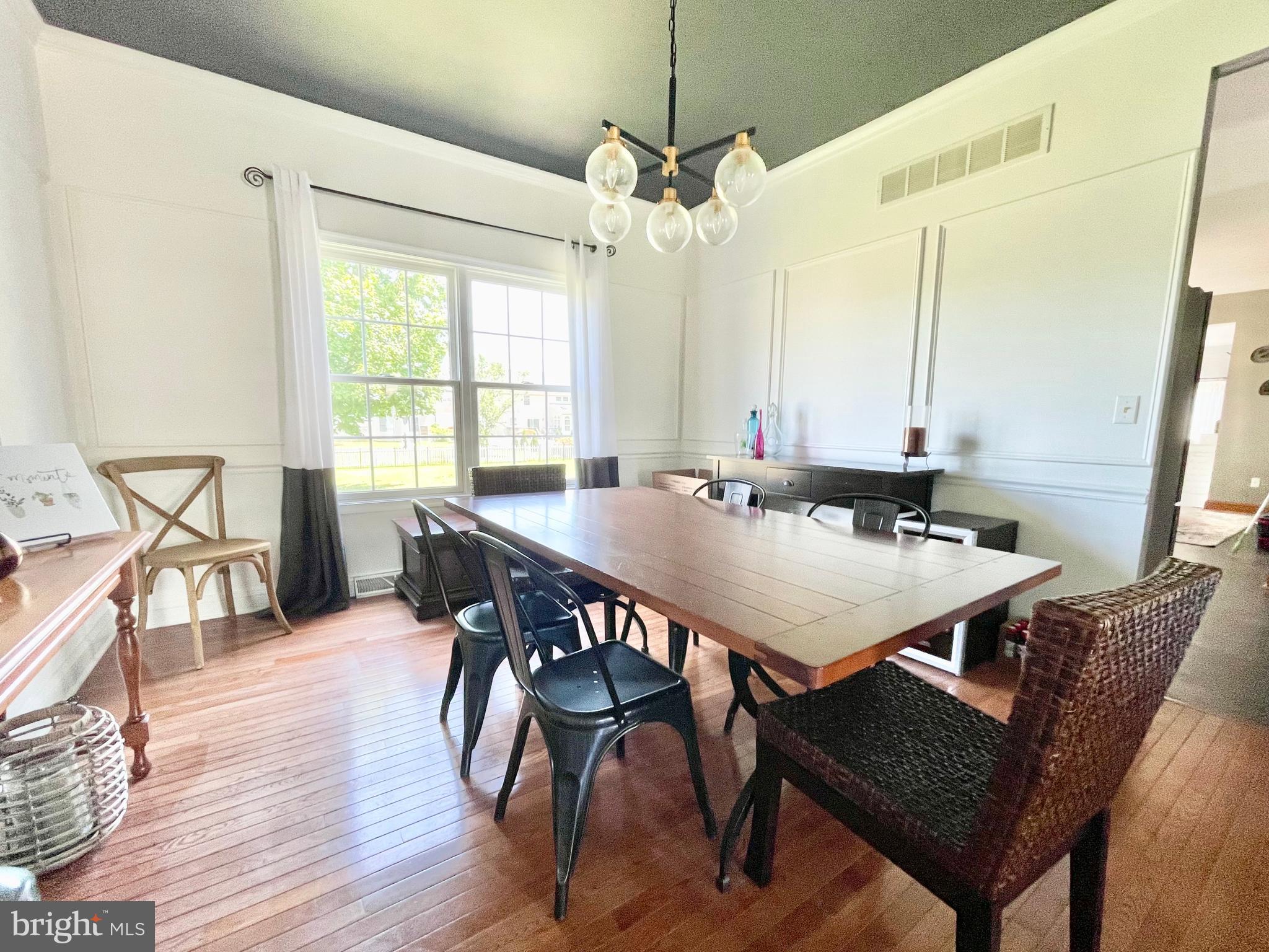 78 Jillian Drive Dover, DE 19901 - Photo 22 of 42 a view of a a dining room with furniture window and wooden floor