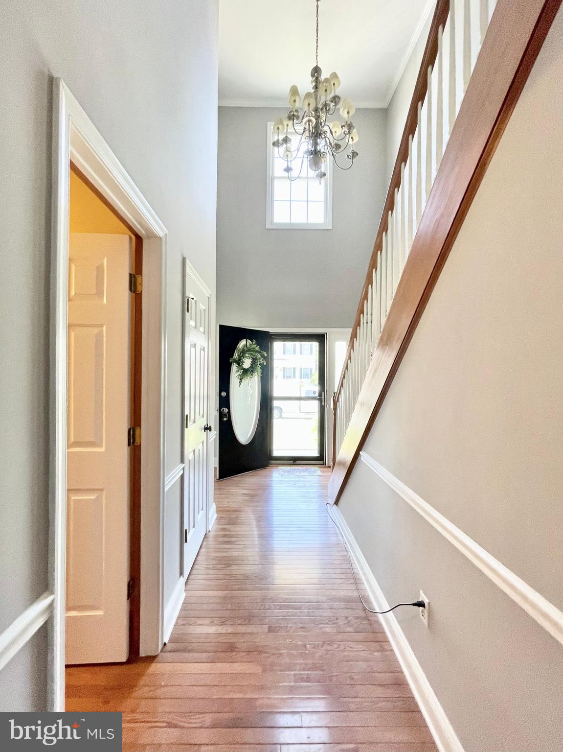 78 Jillian Drive Dover, DE 19901 - Photo 7 of 42 a view of an entryway with wooden floor and door