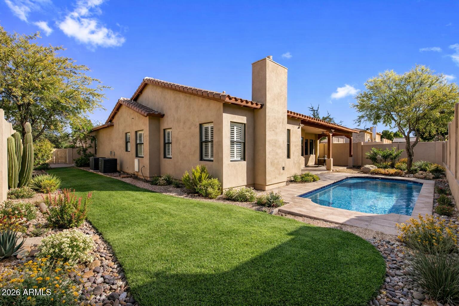 3215 East Constance Way Phoenix, AZ 85042 - Photo 29 of 40 a front view of house with yard and outdoor seating