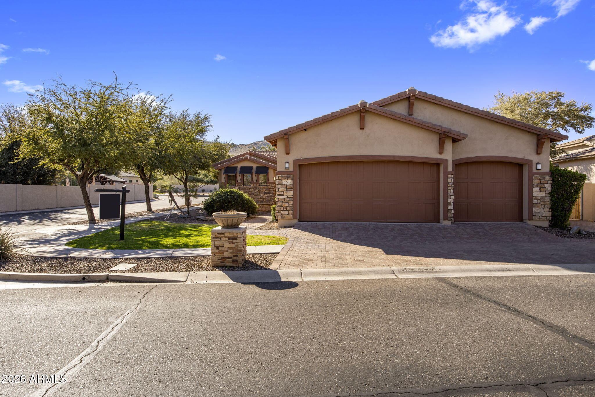 3215 East Constance Way Phoenix, AZ 85042 - Photo 30 of 40 a front view of a house with a yard and garage
