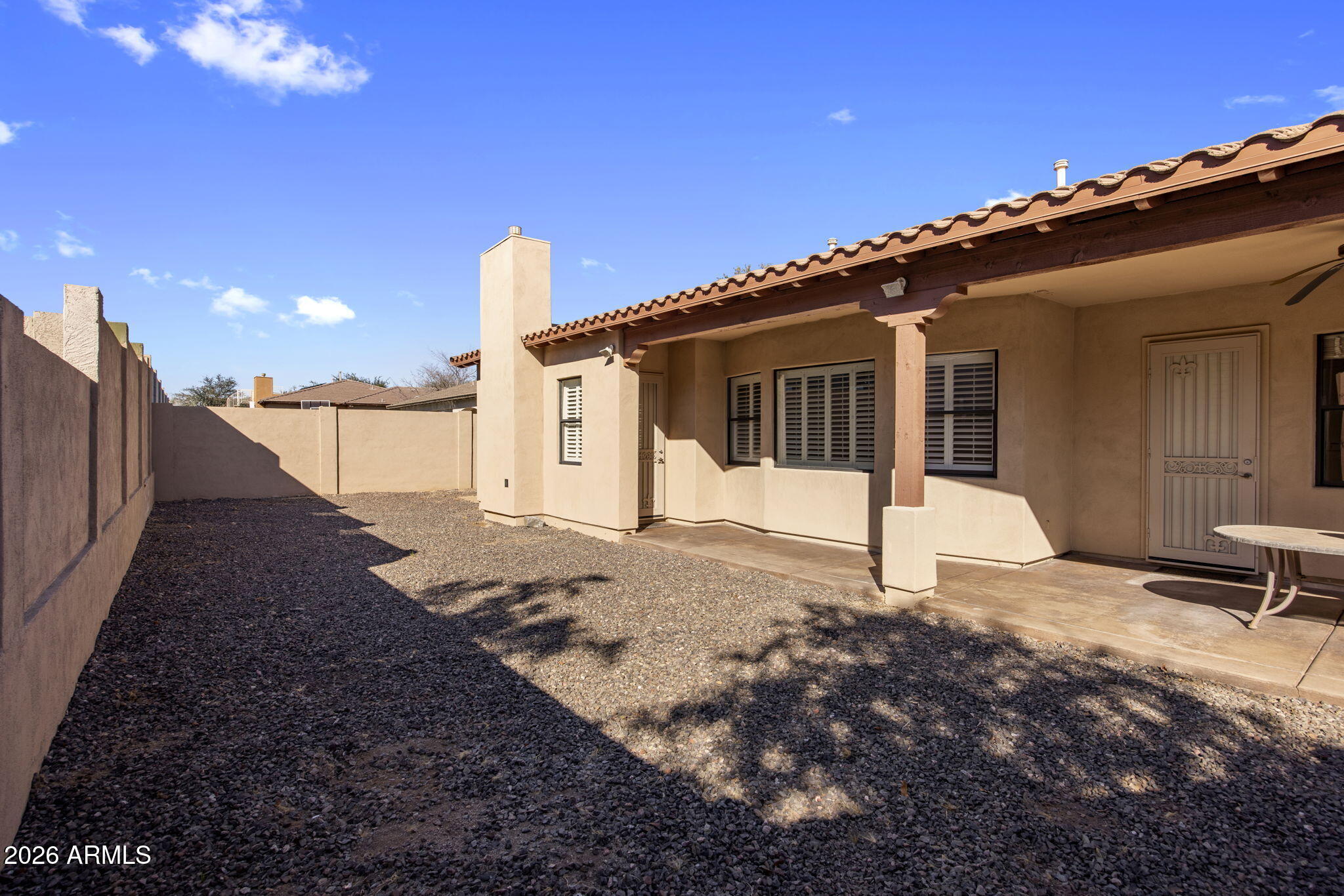 3215 East Constance Way Phoenix, AZ 85042 - Photo 33 of 40 a view of a house with backyard and sitting area