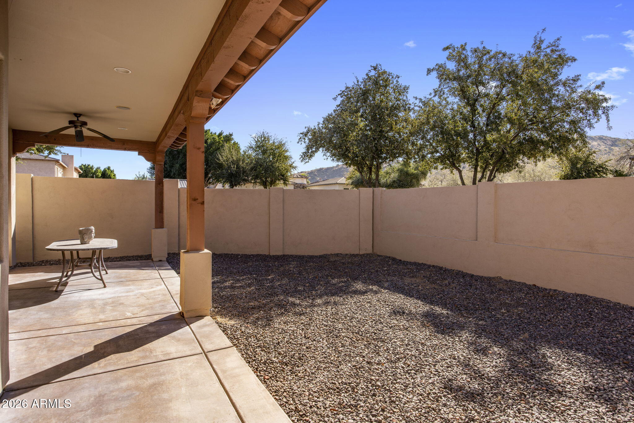 3215 East Constance Way Phoenix, AZ 85042 - Photo 34 of 40 a view of a backyard with a tree