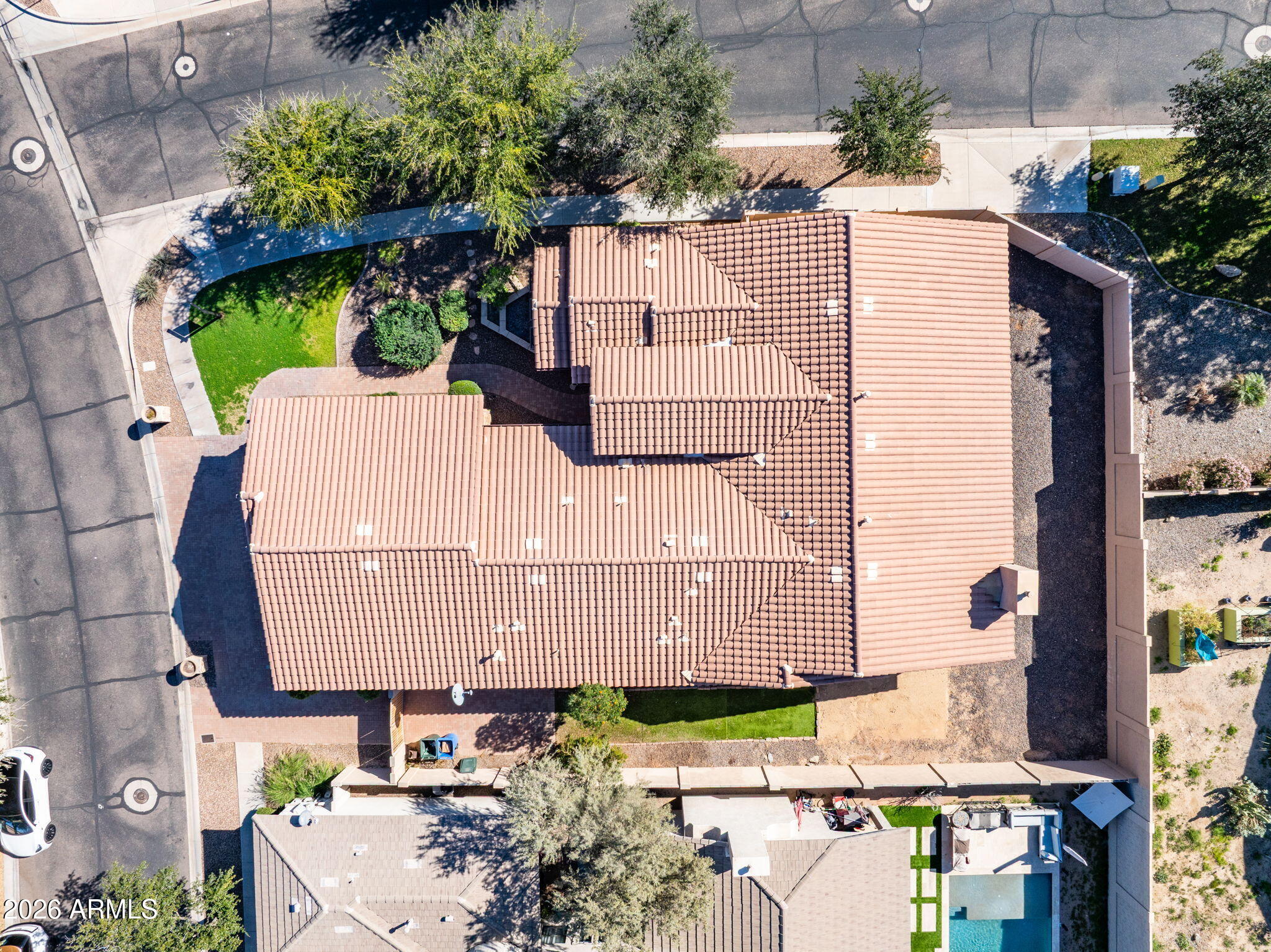 3215 East Constance Way Phoenix, AZ 85042 - Photo 39 of 40 a view of a building with a window and potted plants