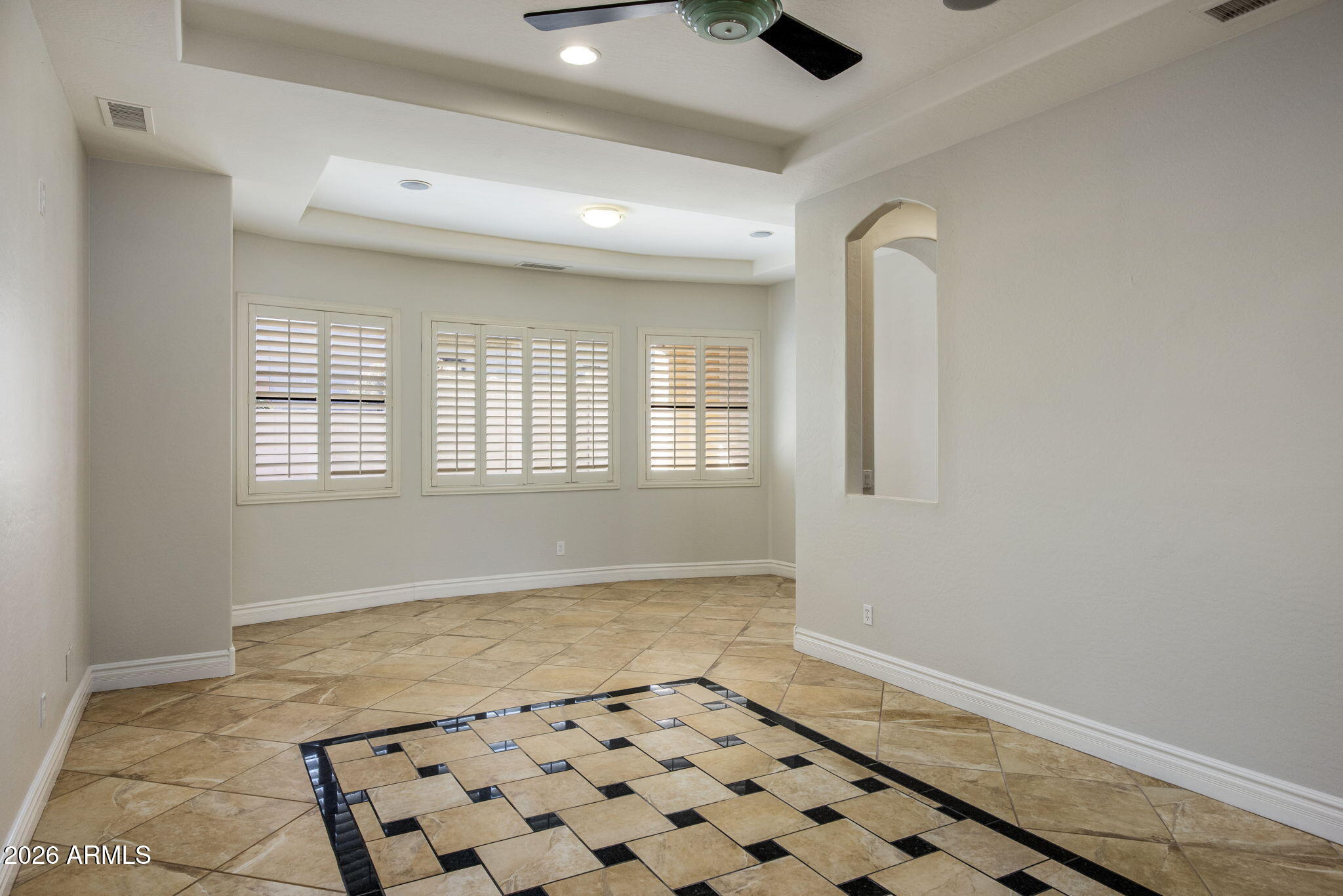 3215 East Constance Way Phoenix, AZ 85042 - Photo 10 of 40 a view of an empty room and window