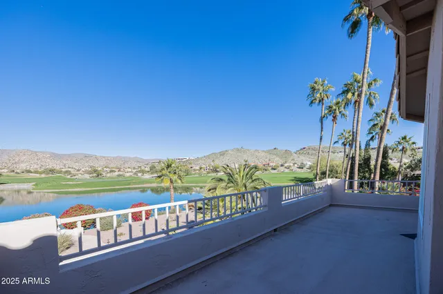 a flower pot sitting in front of a house