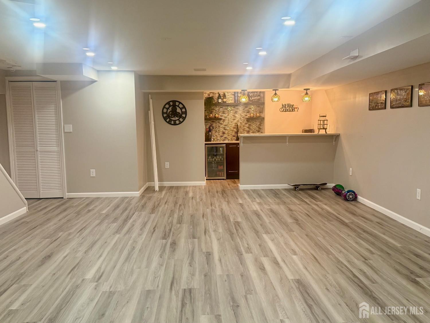 205 Timber Oaks Road Edison, NJ 08820 - Photo 4 of 4 a view of a room with wooden floor and stairs