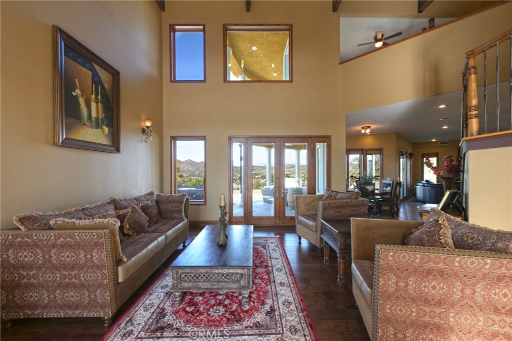 38101 Vía Lobato Temecula, CA 92592 - Photo 14 of 67 a living room with fireplace furniture and a rug