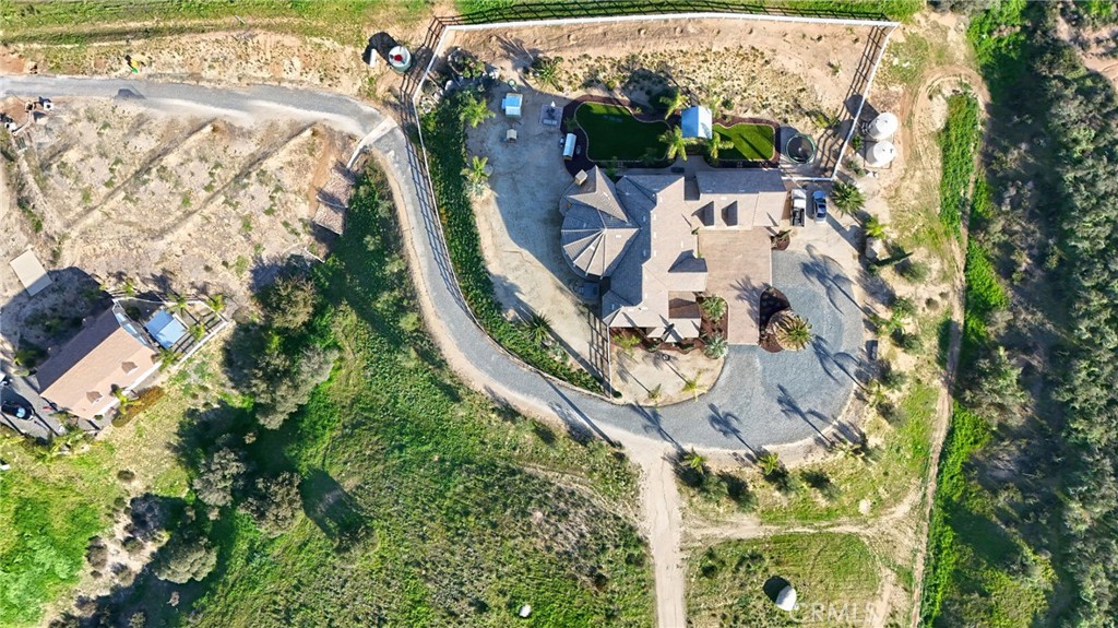 38101 Vía Lobato Temecula, CA 92592 - Photo 18 of 67 an aerial view of a house with a yard