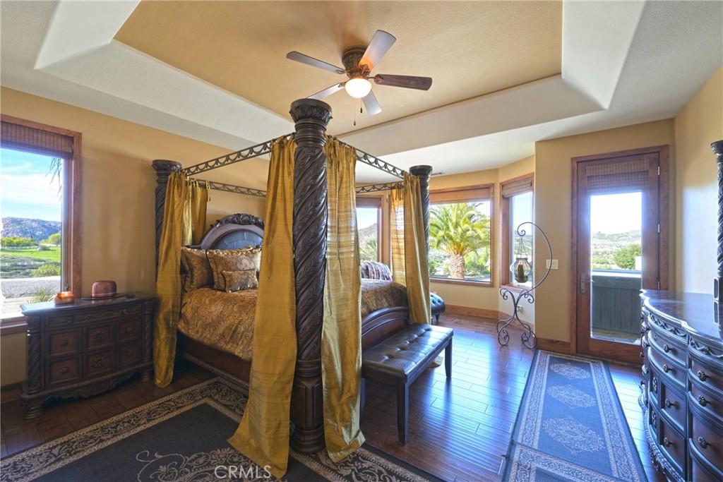 38101 Vía Lobato Temecula, CA 92592 - Photo 22 of 67 a bedroom with furniture and a large window