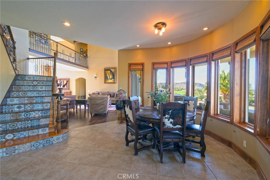 38101 Vía Lobato Temecula, CA 92592 - Photo 25 of 67 a view of a dining room with furniture window and outside view
