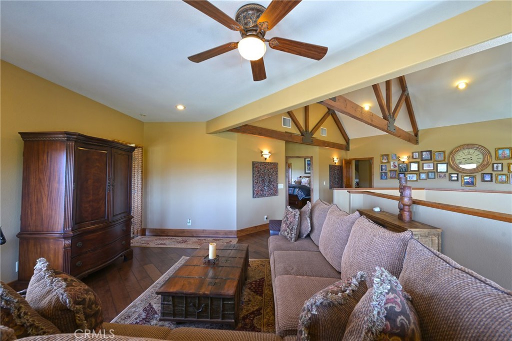 38101 Vía Lobato Temecula, CA 92592 - Photo 37 of 67 a living room with furniture and a chandelier