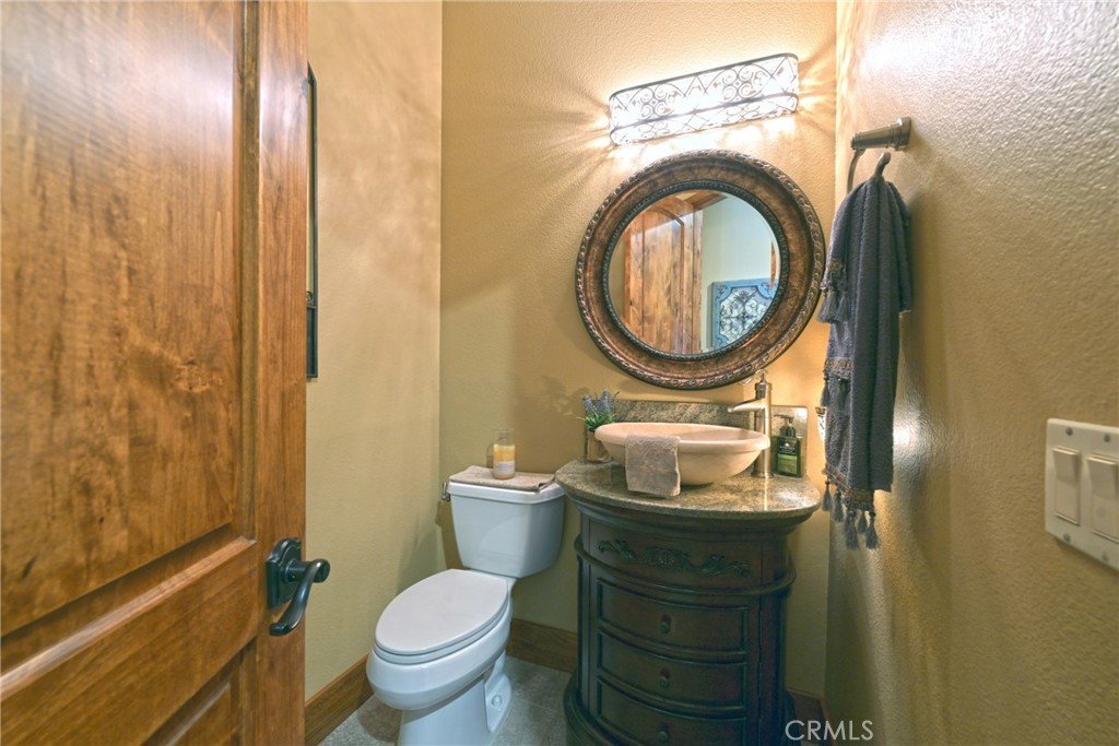 38101 Vía Lobato Temecula, CA 92592 - Photo 41 of 67 a bathroom with a toilet and a sink