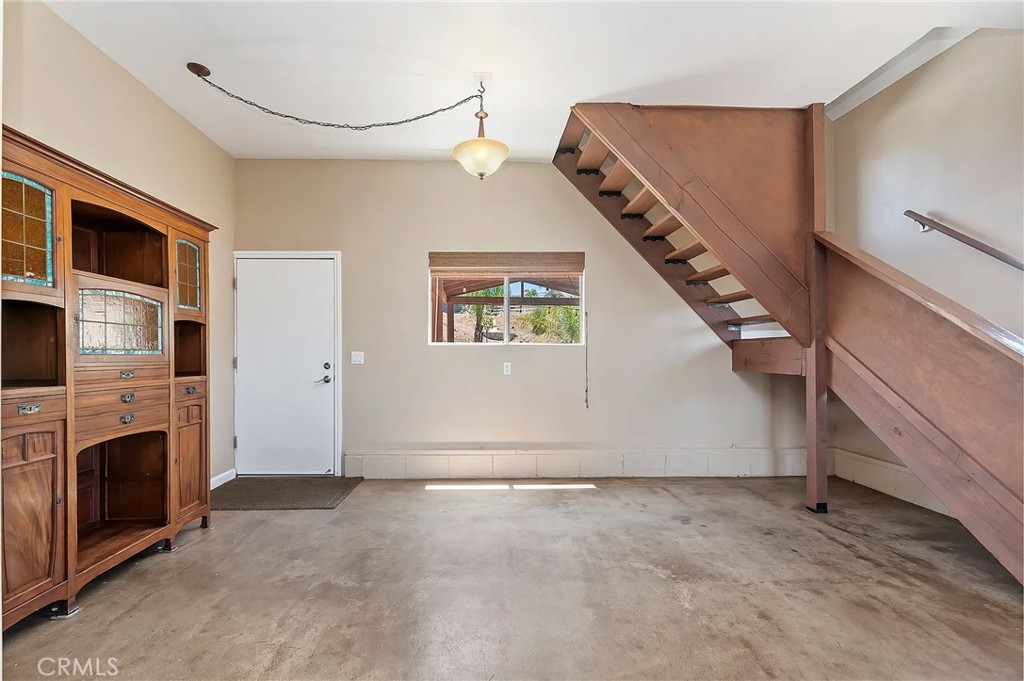 38101 Vía Lobato Temecula, CA 92592 - Photo 48 of 67 a view of a livingroom with an empty space and a fireplace