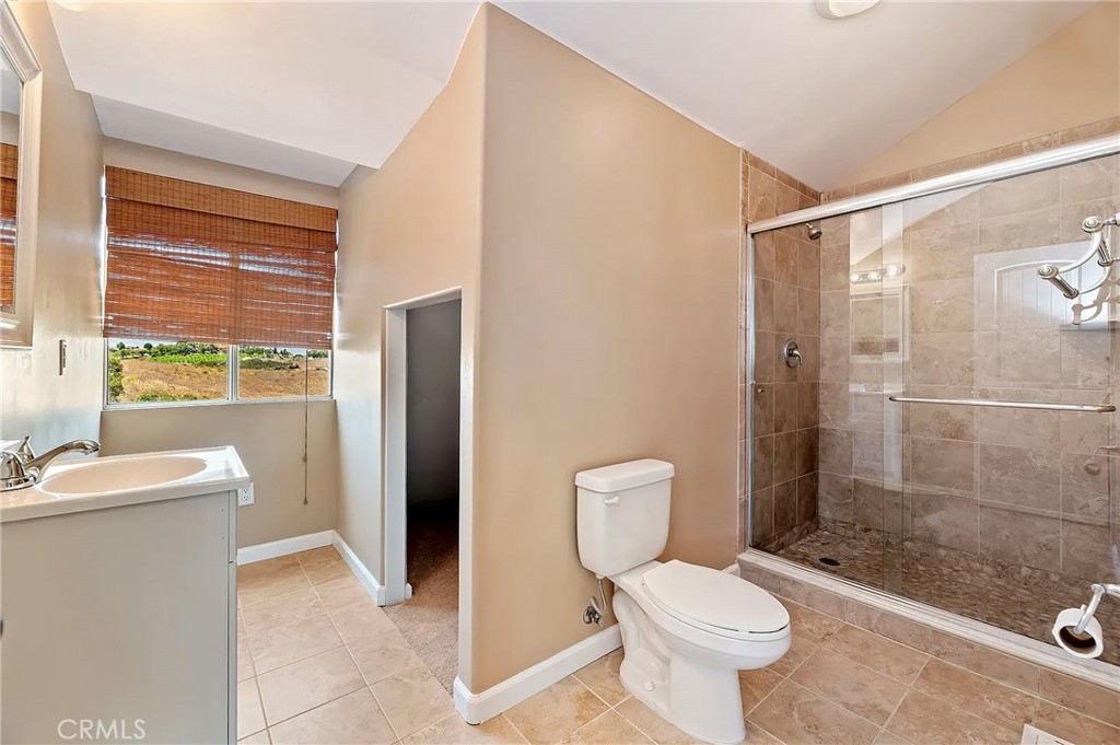38101 Vía Lobato Temecula, CA 92592 - Photo 53 of 67 a bathroom with a toilet sink and shower