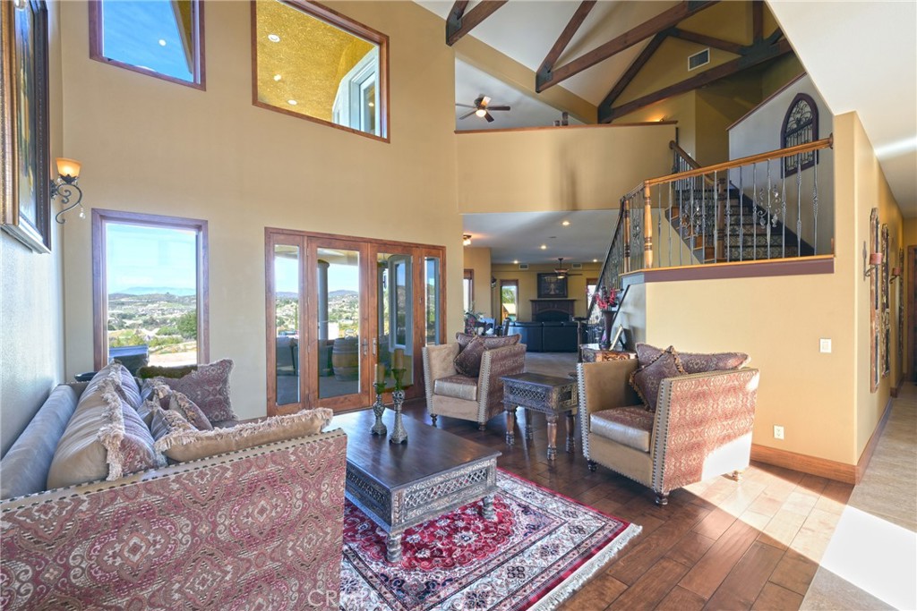 38101 Vía Lobato Temecula, CA 92592 - Photo 7 of 67 a living room with furniture and a table